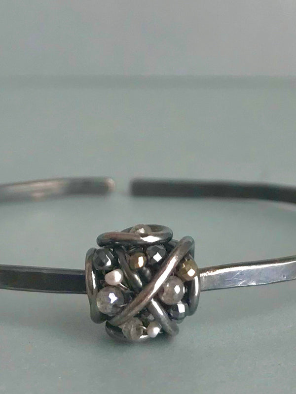 The single cluster cuff bracelet